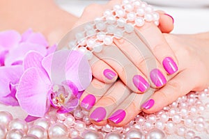 Beautiful Manicure and Pedicure in spa salon.