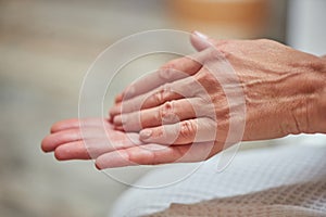 Beautiful manicured middle aged woman hands