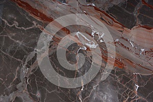 Beautiful marble with pink and red veins, called Caravaggio photo