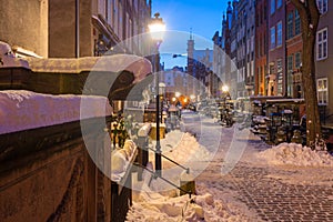 Beautiful Mariacka street in Gdansk at snowy winter, Poland photo
