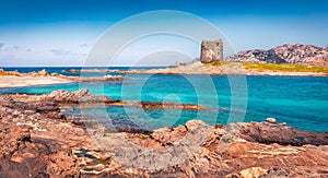 Beautiful marine scenery. Panoramic summer view of Spiaggia della Pelosa beach with Torre della Pelosa tower.