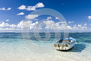 Beautiful Mauritius view with blue ocean and boat