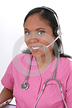 Beautiful Medical Receptionist Wearing Headset