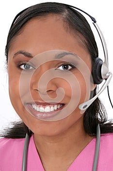 Beautiful Medical Receptionist Wearing Headset