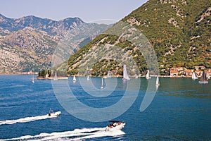 Beautiful Mediterranean landscape with sailboats on the water. Montenegro, Adriatic Sea. View of the Bay of Kotor