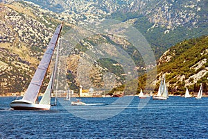 Beautiful Mediterranean landscape with sailboats on the water. Montenegro, Adriatic Sea. View of the Bay of Kotor