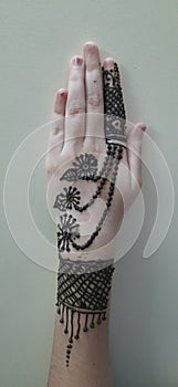 Beautiful mehndi design on hands of a girl.