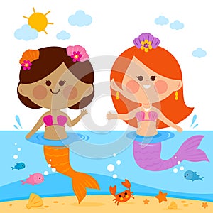 Beautiful mermaids swimming in the water. Vector illustration