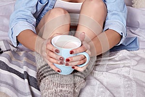 Beautiful Merry Christmas morning brunette woman drink cup sweet