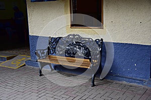 Beautiful metal bench on the square in the city of Aguas calientes, Peru