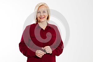 Beautiful middle-age woman smiling warmly over white, smile happy woman