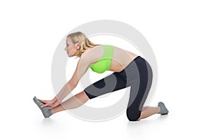 Beautiful middle aged woman doing sport exercise