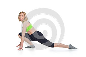 Beautiful middle aged woman doing sport exercise