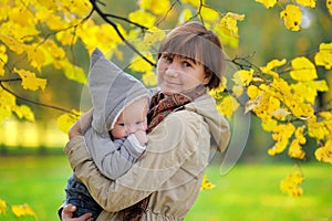 Beautiful middle aged woman and her little grandson