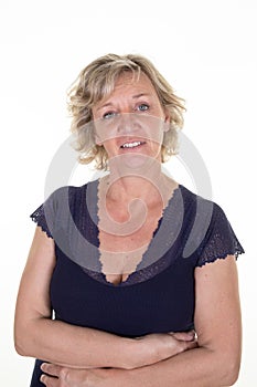 Beautiful middle aged woman mature blonde with crossed arms on white background