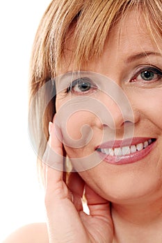 Beautiful middleaged woman on a white background