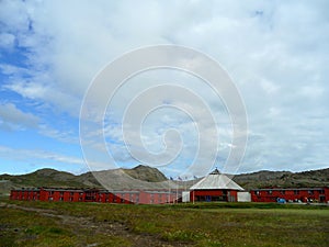 Beautiful midsummer landscape with Norwegian country houses at North Cape, Norway