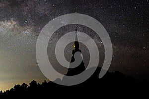 Beautiful milky way galaxy with stars over silhouette pagoda at Doi Inthanon , Chiang Mai ,Thailand