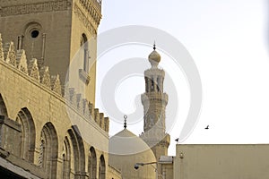 The beautiful minaret and dome of mosque in muiz street