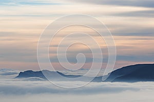 Beautiful minimalist sunrise landscape with the Safor mountains from the Alt de les Pedreres in Alcoy