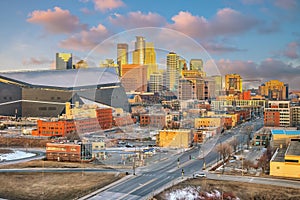 Beautiful Minneapolis downtown city skyline with traffic light at sunset