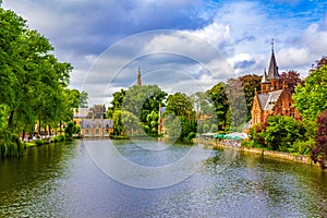 Beautiful Minnerwater park and canal Bruges city Belgium