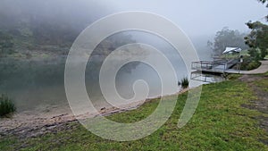 Beautiful misty lake landscape in Ferntree Gully in Melbourne, Victoria, Australia