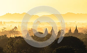 Beautiful misty sunrise over the plains of Bagan, Myanmar.