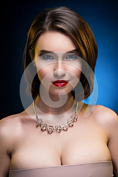 Beautiful mixed asian-caucasian race girl wearing necklace