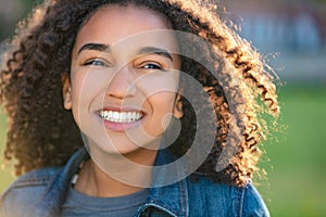 Beautiful Mixed Race African American Girl Teenager Smiling WIth Perfect Teeth
