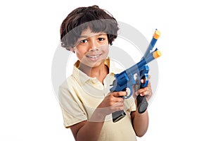 Beautiful Mixed Race Boy Playing with Toy Guns