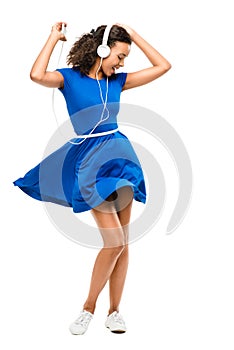 Beautiful mixed race woman dancing blue dress isolated on w