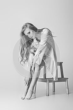 Beautiful model blonde posing in studio