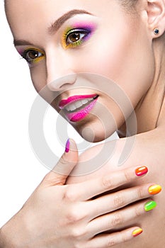 Beautiful model girl with bright colored makeup