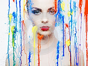 Beautiful model through the glass with bright colors