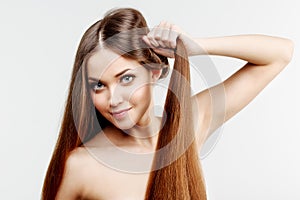Beautiful model with healthy shiny long hair. Beauty luxurious h