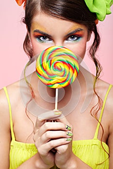 Beautiful model with lollipop