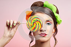 Beautiful model with lollipop