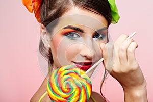 Beautiful model with lollipop