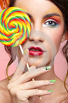 Beautiful model with lollipop