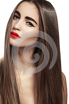 Beautiful model with long straight hair & red lips make-up