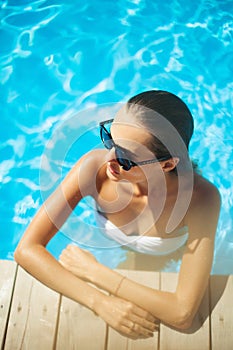 Beautiful model in a swimming pool