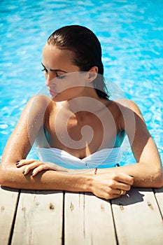 Beautiful model in a swimming pool