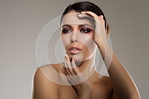 Beautiful model woman in beauty salon makeup Young modern girl