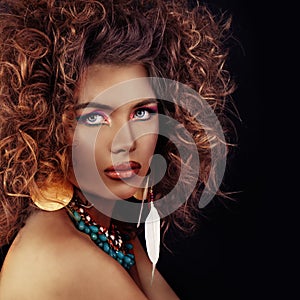 Beautiful Model Woman. Curly Hair, Makeup and Dark Bronze Skin