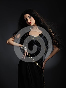 Beautiful model woman with long black healthy hair