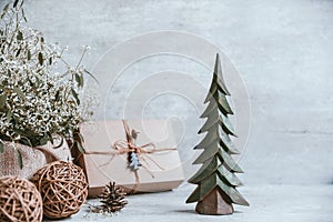 Beautiful and modern christmas gift composition on wooden background