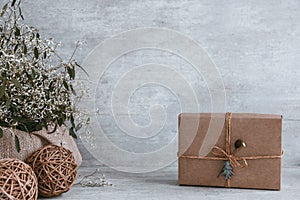 Beautiful and modern christmas gift composition on wooden background. Copy space, greeting card