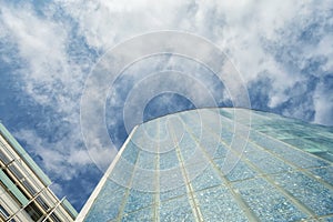 Beautiful Modern Glass Office Building Cloudy Sky Background Bottom View Copenhagen Denmark. European architecture Architecture