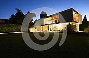 Beautiful modern house outdoors at night